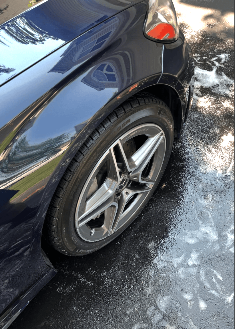 Glossy wheel and tire after ceramic coating prep — SmartShine in Overland Park